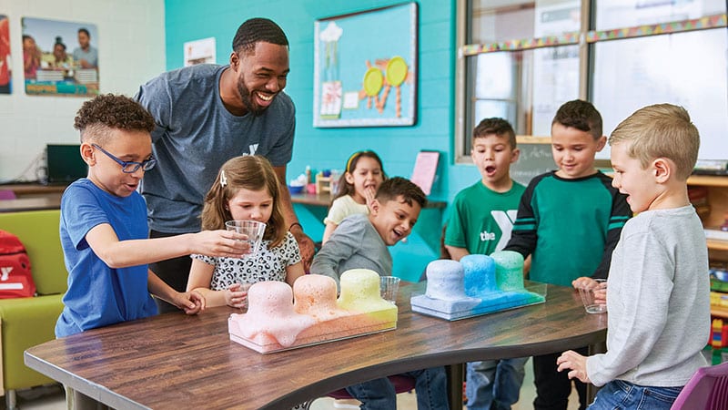 kids engage in fun science activity to make colorful foam