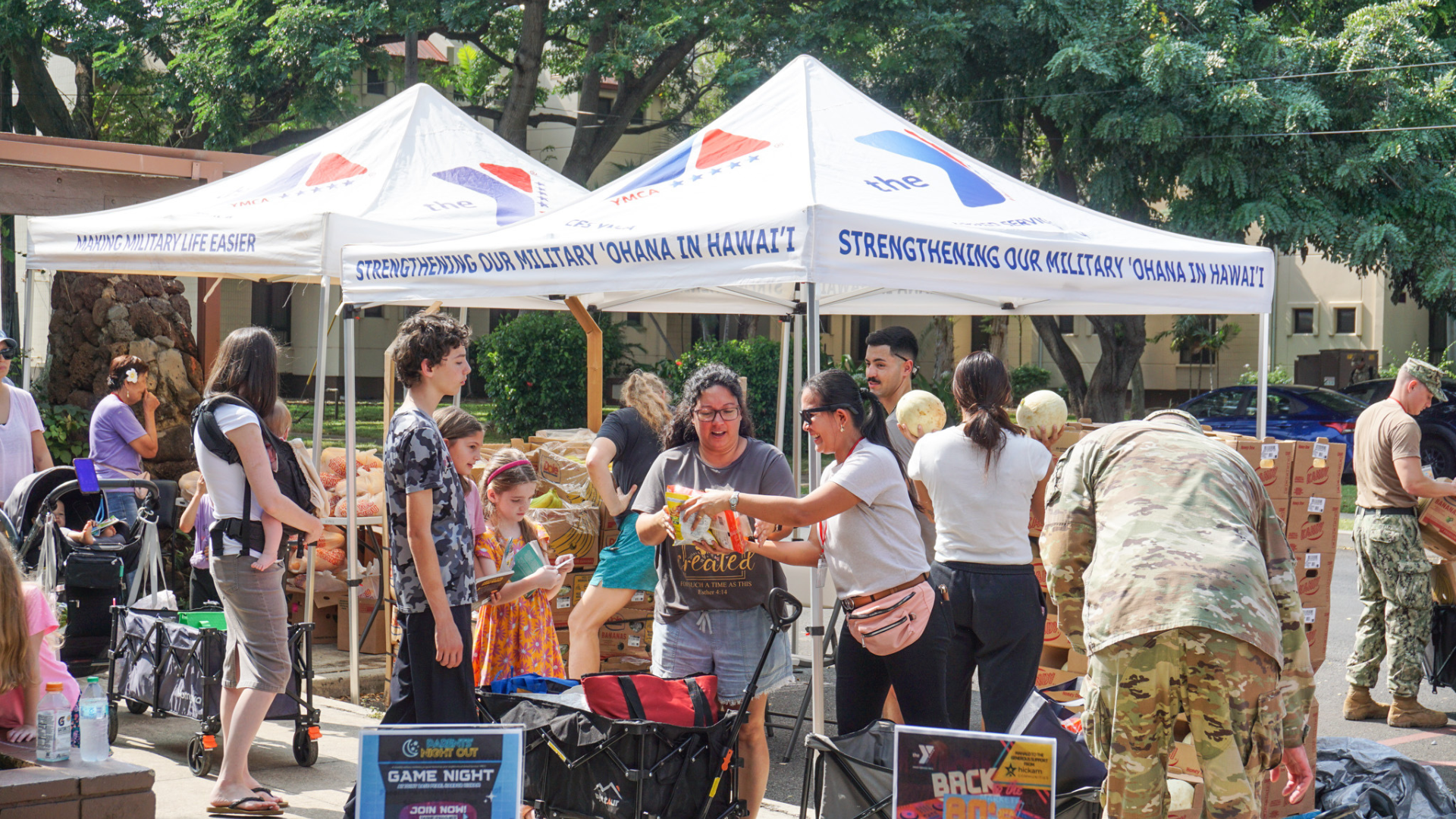 ASYMCA volunteers helping with a food distribution event